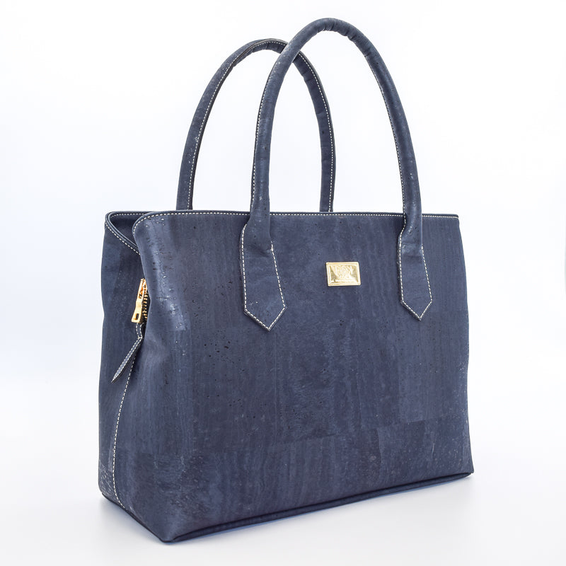 Eduarda vegan cork leather navy satchel bag in navy with gold hardware. Cruelty free and peta approved. 