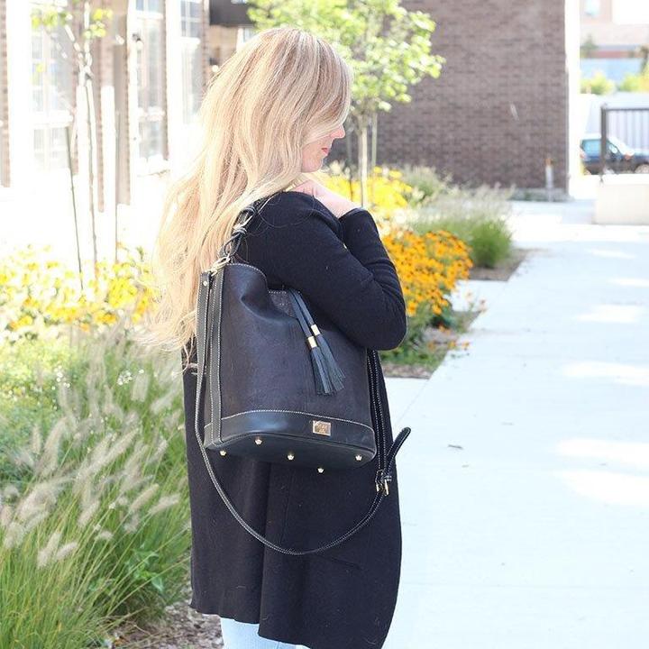 Julia cork hobo handbag in black with gold brassware. With a strap so that this bag can be worn as a crossbody.