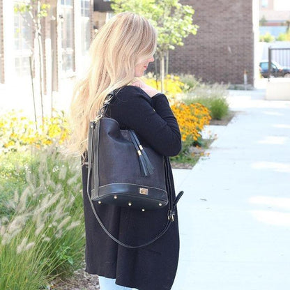 Julia cork hobo handbag in black with gold brassware. With a strap so that this bag can be worn as a crossbody.