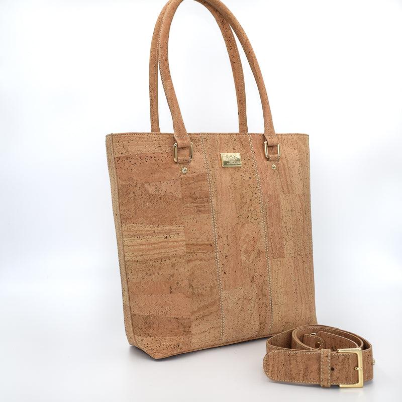 Marge medium tote bag in natural colour. Strap included which allow the bad to be a cross body as well.  Made from cork leather and is vegan and peta approved.