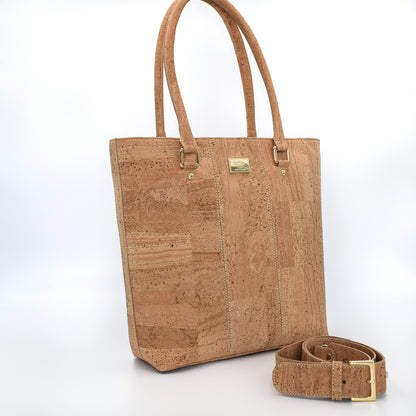 Marge medium tote bag in natural colour. Strap included which allow the bad to be a cross body as well.  Made from cork leather and is vegan and peta approved.