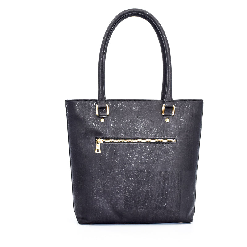 Marge medium tote bag in black colour. Strap included which allow the bad to be a cross body as well. Made from cork leather and is vegan and peta approved.