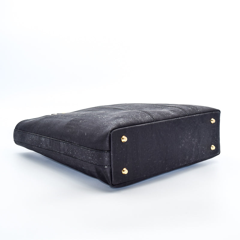 Marge medium tote bag in black colour. Strap included which allow the bad to be a cross body as well. Made from cork leather and is vegan and peta approved.