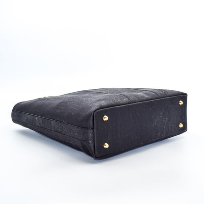 Marge medium tote bag in black colour. Strap included which allow the bad to be a cross body as well. Made from cork leather and is vegan and peta approved.