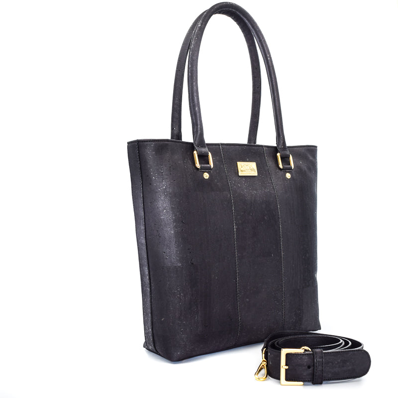 Marge medium tote bag in black colour. Strap included which allow the bad to be a cross body as well. Made from cork leather and is vegan and peta approved.