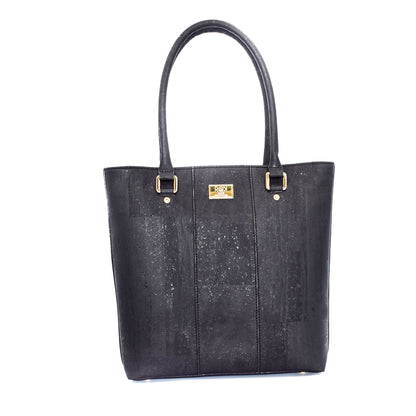 Marge medium tote bag in black colour. Strap included which allow the bad to be a cross body as well. Made from cork leather and is vegan and peta approved.