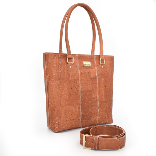 Marge medium tote bag in salted caramel colour. Strap included which allow the bad to be a cross body as well. Made from cork leather and is vegan and peta approved.